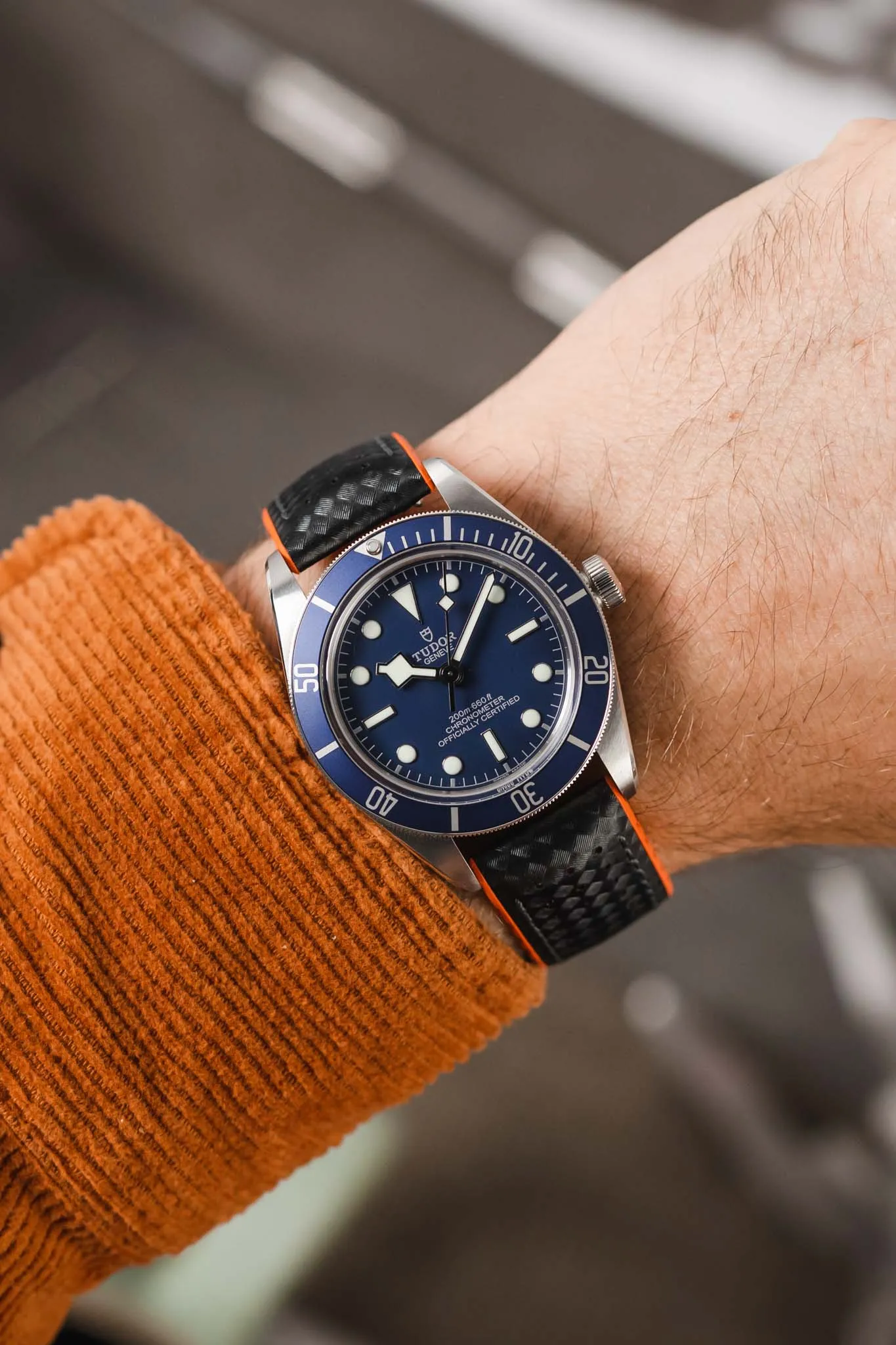 Hirsch AYRTON Carbon Embossed Performance Watch Strap in BLACK / ORANGE