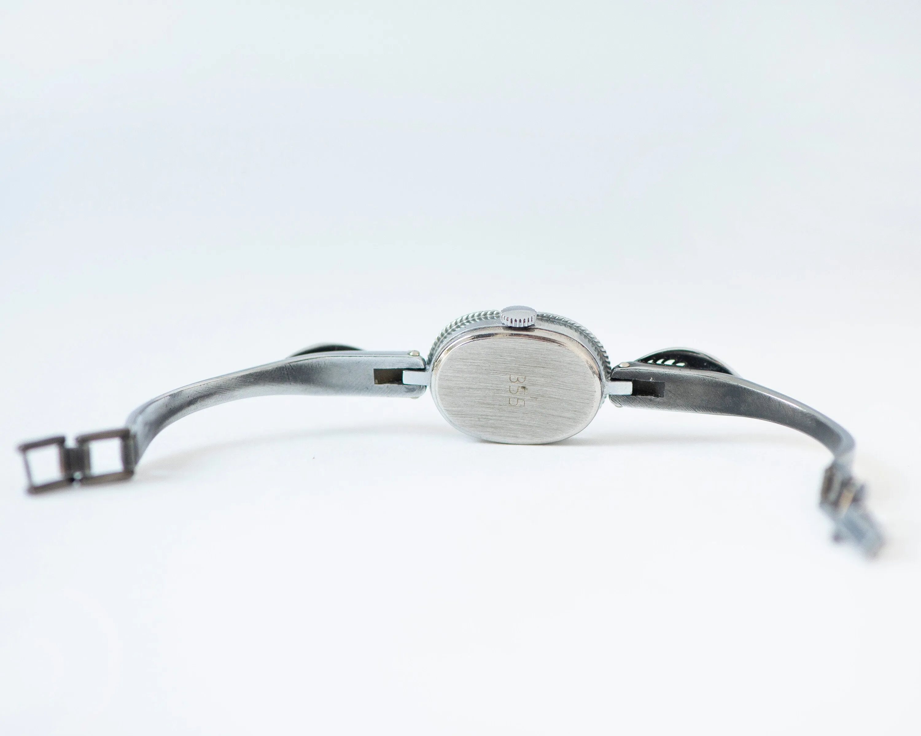 Mint condition women cocktail watch oval blue dial leaf trim on bangle, vintage watch for women Ray silver shade, classic jewelry bracelet